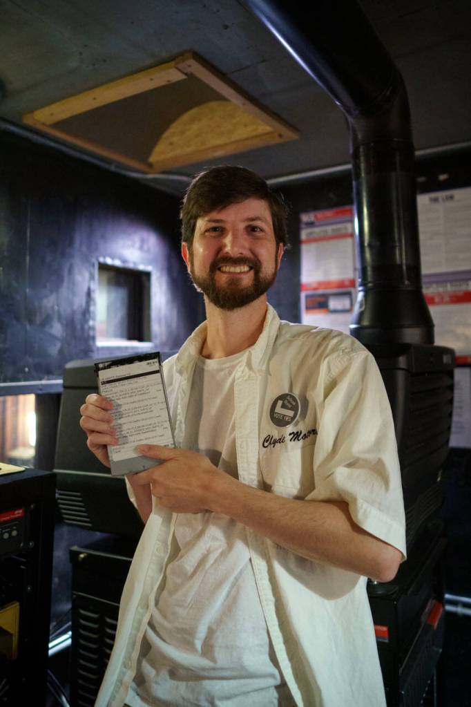 Brook Willeford holds up an external hard drive containing Indiana Jones and the Dial of Destiny. The majority of movies shown at The Clyde these days come in this form.