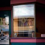 The late Lynn Willeford, the heart of The Clyde Theatre, in the ticket booth in 2011.