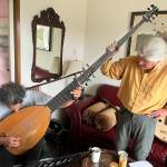 Photo provided
Troy Chapman, left, plays the long-necked theorbo with some support from Gus Denhard. The two guitarists will play with Andre Feriante in a performance at this years Whidbey Island Guitar Festival called Old Men with Lutes.
