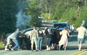 Photo provided
Bystanders saved a man from a car after a crash.