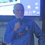 Bill Collier gives a presentation at a luncheon sponsored by Pacific Northwest Naval Air Museum. (Photo by Karina Andrew/Whidbey News-Times)