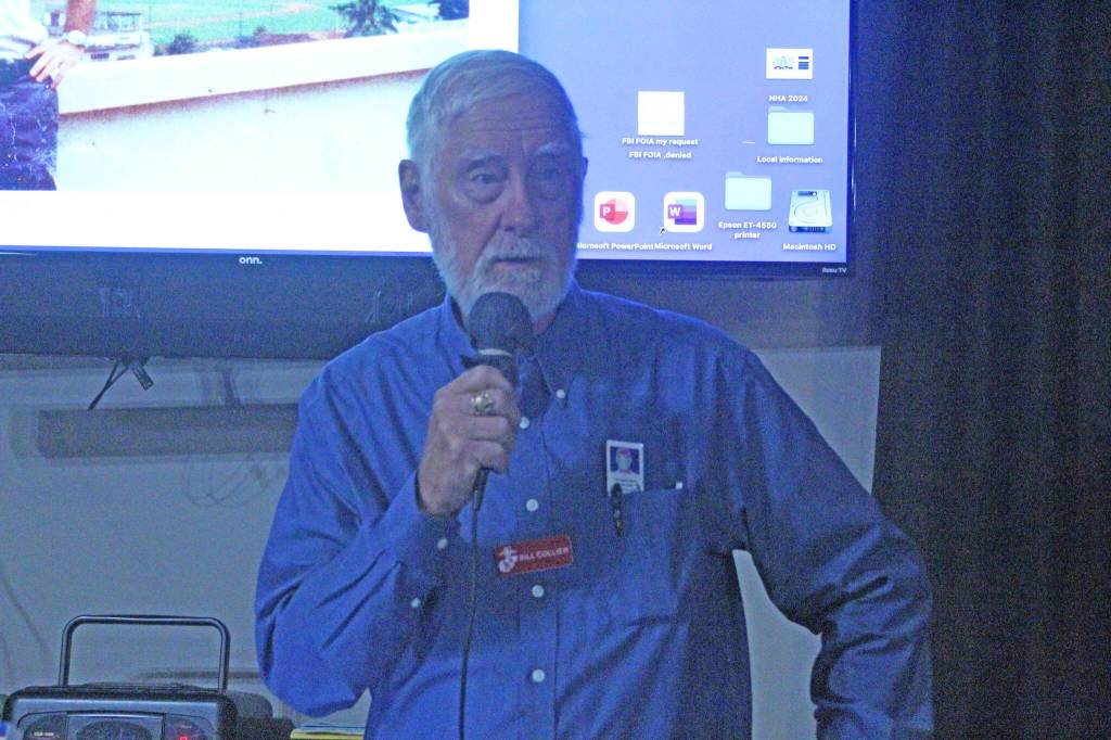 Bill Collier gives a presentation at a luncheon sponsored by Pacific Northwest Naval Air Museum. (Photo by Karina Andrew/Whidbey News-Times)