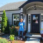 Larsen poses in front of her new business. (Photo by Luisa Loi)