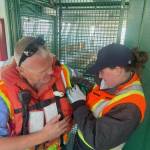 Ryan Jones handed off the kitten to Chrystyl Levee Zwink. (Photo provided)