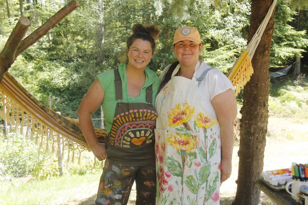 Rachel Phillips, left, and Meredith Cannon are the heARTists. The two painters are taking requests for any project. (Photo by Kira Erickson/South Whidbey Record)