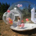 Teagan has fun playing in the Bubble Inflatable.