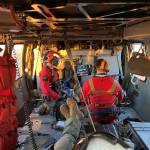 Photo provided
A Navy Search and Rescue crew responds to a hiker suffering a heat-related medical condition in Okanogan County Aug. 13.