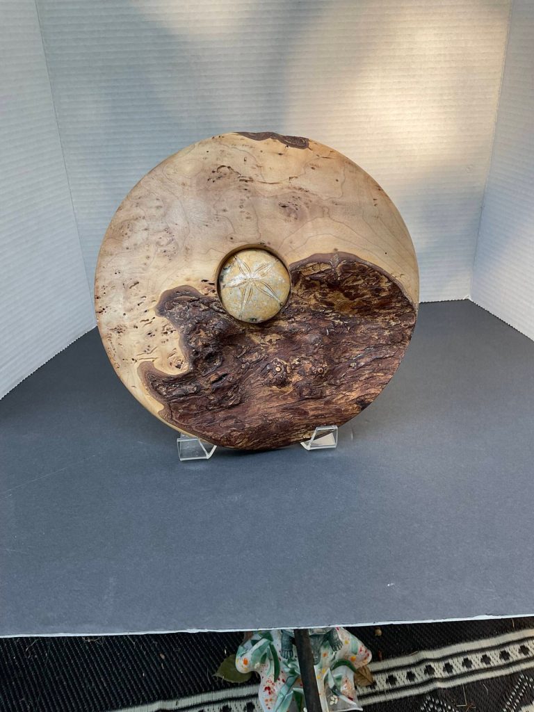 Photo provided
An art piece made with a sand dollar and driftwood by Thomas Eller.