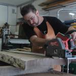 Photo by Karina Andrew/Whidbey News-Times
Ty Balascio of Coastal Woodworks cuts of a piece of wood in his Oak Harbor shop Aug. 23.
Photo by Karina Andrew/Whidbey News-Times
Ty Balascio of Coastal Woodworks cuts of a piece of wood in his Oak Harbor shop Aug. 23.