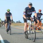 Photo by Karina Andrew/Whidbey News-Times
Cyclists from the Naval Academy class of 1983 begin their transcontinental bike ride to Annapolis, Maryland, where they will celebrate their 40-year reunion.