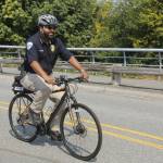 Photo by Kira Erickson/South Whidbey Record
Langley Police Chief Tavier Wasser cycles down First Street in the Village by the Sea.