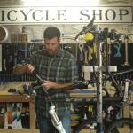 Photo by Karina Andrew/Whidbey News-Times
Trevor Stevens, owner of Celerity Cycles, fixes a bicycle in his home shop in Coupeville.