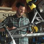 Photo by Karina Andrew/Whidbey News-Times
Trevor Stevens, owner of Celerity Cycles, fixes a bicycle in his home shop in Coupeville.