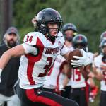 Coupeville junior receiver Hunter Bronec rumbles for the end zone. (Photo by John Fisken)