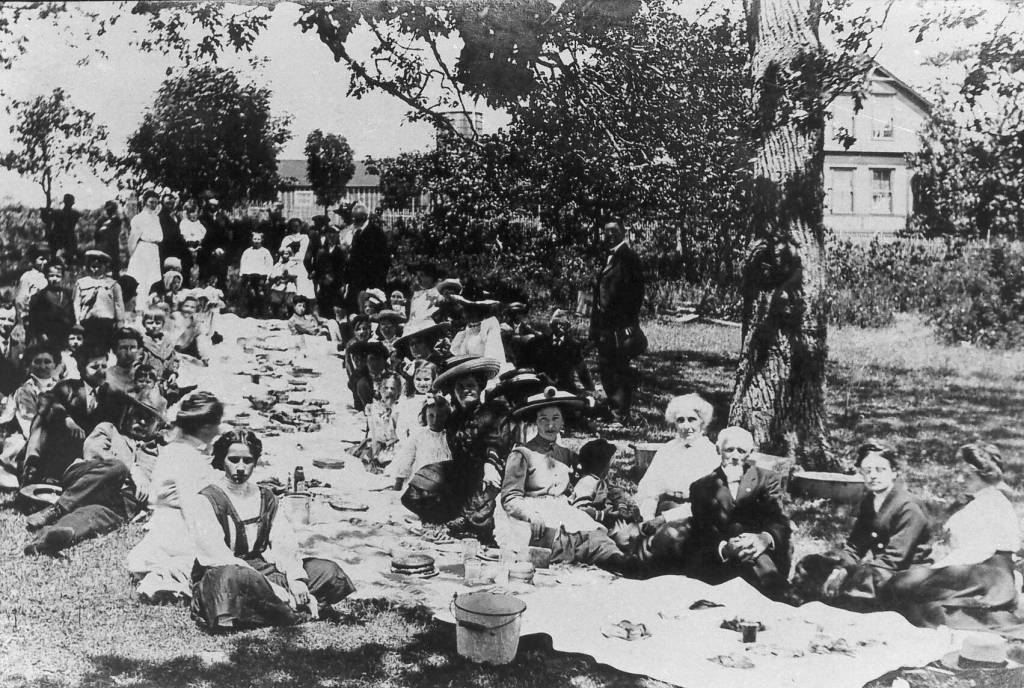 Oak Harbor community members enjoy a picnic in Smith Park in the early days of the Womens Improvement Club. (Photo provided)