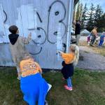 Some young scouts paint over graffiti at Volunteer Park. (Photo provided)
