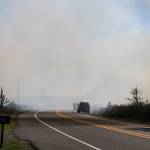 The smoke from the fires covered the clear sky, as seen from Engle Road. (Photo by Luisa Loi/Whidbey News-Times)