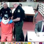 Richard Martin became unruly and had to be retrained while appearing in court by video from the jail.