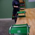 Echo stands by the pasta rollers in her pasta classroom. (Photo by David Welton)