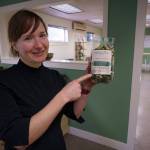 Echo shows a bag of her certified organic fusilli. (Photo by David Welton)