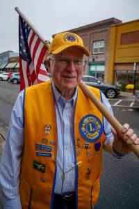Doug Jerome holds a flag. (Photo by David Welton)