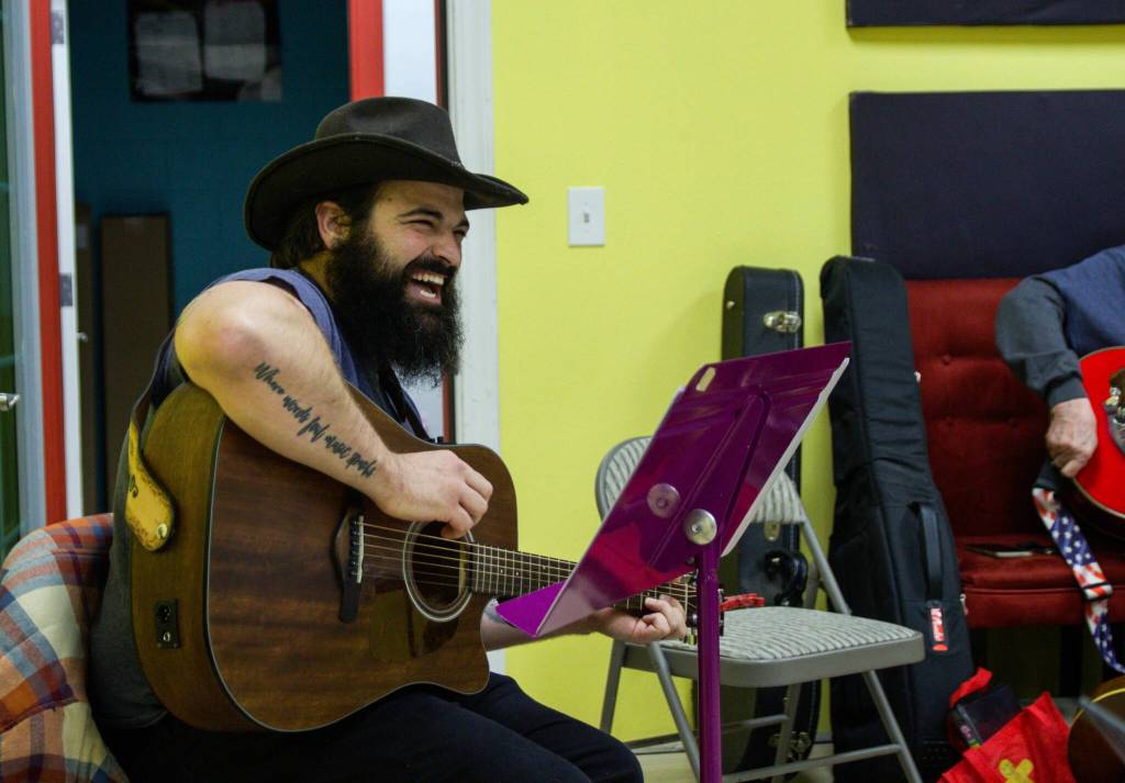 Cole Cartee is a new instructor at the Oak Harbor chapter of Guitars for Vets. (Photo by Luisa Loi)