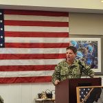 Capt. Eric Hanks, commanding officer of Whidbey Island Naval Air Station, spoke at Regency on Whidbey in commemoration of Veterans Day. Certificates were handed out to veterans and roses were given to their spouses.