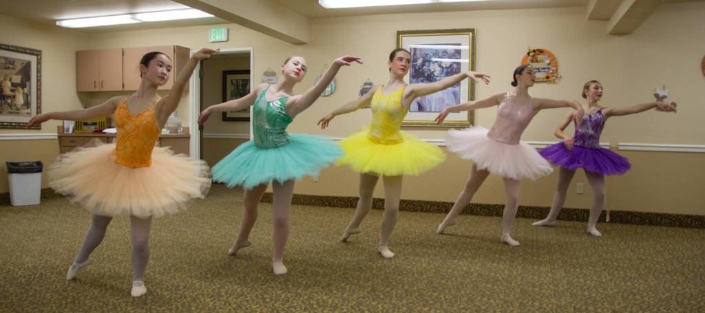 The Sweets dance in the Land of Sweets. Starting from the left, Hannah Brackeen, Ana Kettlewell, Lily Brinlee, Riley White and Tessa Lang, who are some of the oldest and most experienced dancers selected to perform in the show. (Photo by Luisa Loi)