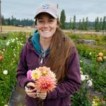 Emily Martin with a fresh bouquet of flowers in August 2023. (Photo by David Welton)