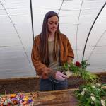 Celosia adds a burst of color to the fresh foliage wreath. (Photo by David Welton)