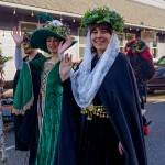 People wore creative costumes of all kinds to the parade. From left, Jackson Alford as the Holly King, Bijan Mitchell as the Yule Witch and Katie Goudey as Santa Lucia. (Photo by David Welton)