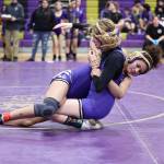 Oak Harbor wrestlers Carla Turner and Genesis Egli compete during the Purple and Gold event Thursday night at Oak Harbor High Schools gym. (Photo by John Fisken)