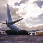 The Navy P8-A Poseidon is removed from the water with the help of inflatable salvage roller bags, placed under the aircraft. (Photo by Lance Cpl. Hunter Jones)