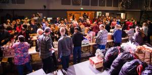Photo provided
Life Church volunteers assemble meals that will be distributed to low-income families on Dec. 17.