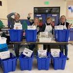 Photo provided
From left, rePurpose volunteers Sheila Bélanger, Joan Green, Susan Prescott and Anne Hayden sort recyclable materials into bins.