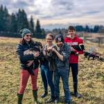 The Bell family adopted three rescue lambs from Ballydidean Farm Sanctuary this past spring. From left, Emily with Poppet, Zetta with Widget, Shaun and Tyson with Otis. (Photo provided)