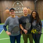 Timm Sanford, left, is an instructor at Whidbey Pickle Barn, which Paul, middle, and Abi Tschetter own. (Photo by David Welton)