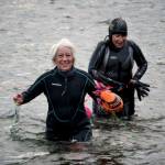 Photo by David Welton
Sharon Emerson and Kate Poss exit from their morning swim at the Langley marina