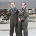 Lt. Peggy Dente, left, and Lt. Lyndsay Evans represented the U.S. Navy  and Oak Harbor  as part of an all-female crew that participated in the traditional Super Bowl Sunday flyover. (Photo by Karina Andrew)