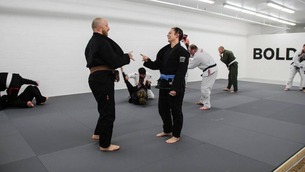 Mychal and Jorgi Cohen joke before sparring. (Photo by Luisa Loi)
