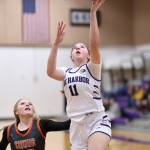 Oak Harbor sophomore Layla Suto shoots a layup against Washougal Dec. 29. Oak Harbor won 38-32. (Photo by John Fisken)