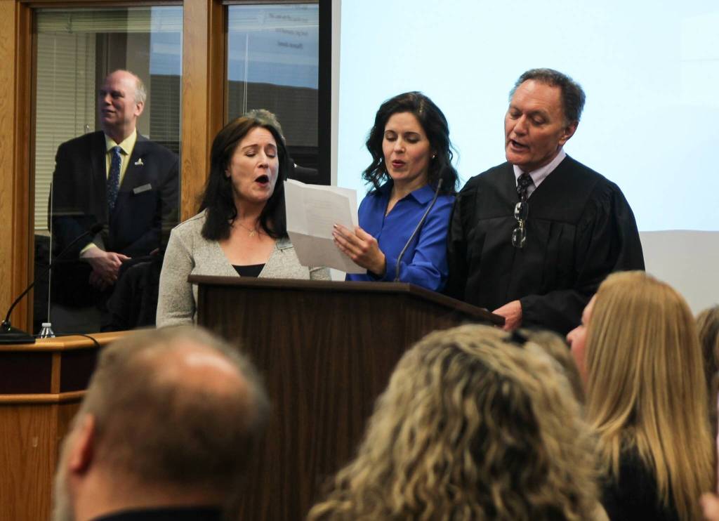 Judge William Hawkins surprised Bob Severns, his old friend, with a parody of 50 Ways to Leave your Lover, renamed 50 Ways to Leave your City. (Photo by Luisa Loi)