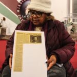 Pastor Dean framed this Crosswind story from 1988, when she worked as a manager at the bases food court. (Photo by Luisa Loi)