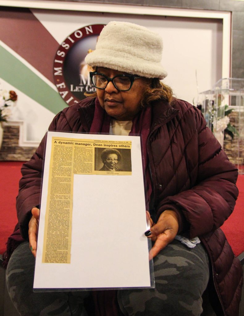 Pastor Dean framed this Crosswind story from 1988, when she worked as a manager at the bases food court. (Photo by Luisa Loi)