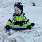 Aspen Turner, 4, sledded with his dad all day near Deception Pass. (Photo by Randi Harris)