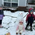 The Butler siblings, Stephanie, Cora and Nolan, built a snowman and gave it pepperoni eyes. (Photo by Samantha Butler)