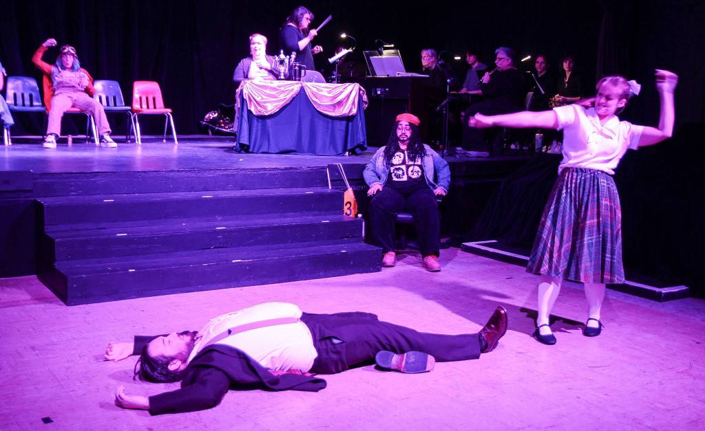 Marcy Park (Karina Andrew) punches the judge, Douglas Panch (Wesley Moran). (Photo by Luisa Loi)