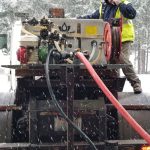 On January 18, 2024, Public Works Department staff Jeremy Freer prepares salt water brine for anti-icing of the Citys roads and for use on the Navy base. (Photo courtesy of City of Oak Harbor Public Works)