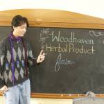 Ninth grader Liam Gilles sprays a jasmine and frankincense spritzer he concocted. (Photo by Kira Erickson/South Whidbey Record)