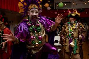 Matt Hoar wears all the colors of Mardi Gras, including a purple beard. (Photo by David Welton)